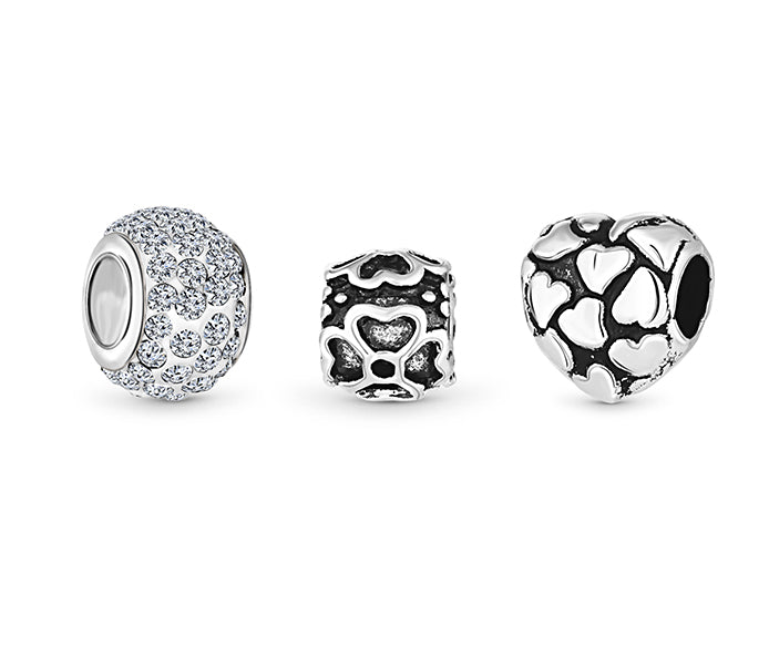 Charm bracelet with central heart and moon charms