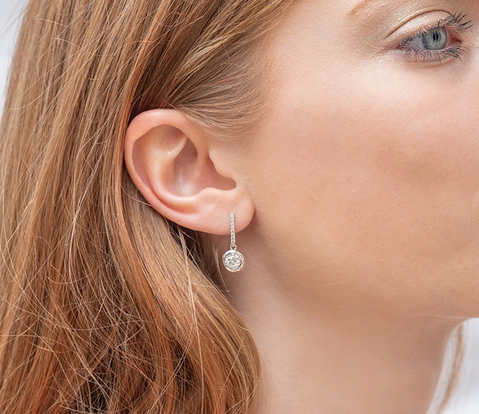 Circle surround drop earrings with crystals in rho