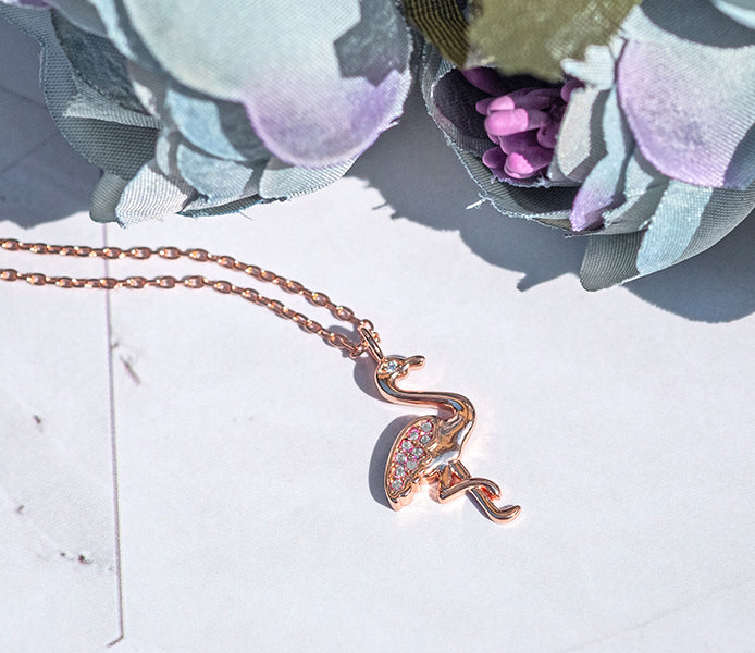 FLAMINGO PENDANT IN ROSE GOLD PLATING WITH CLEAR C