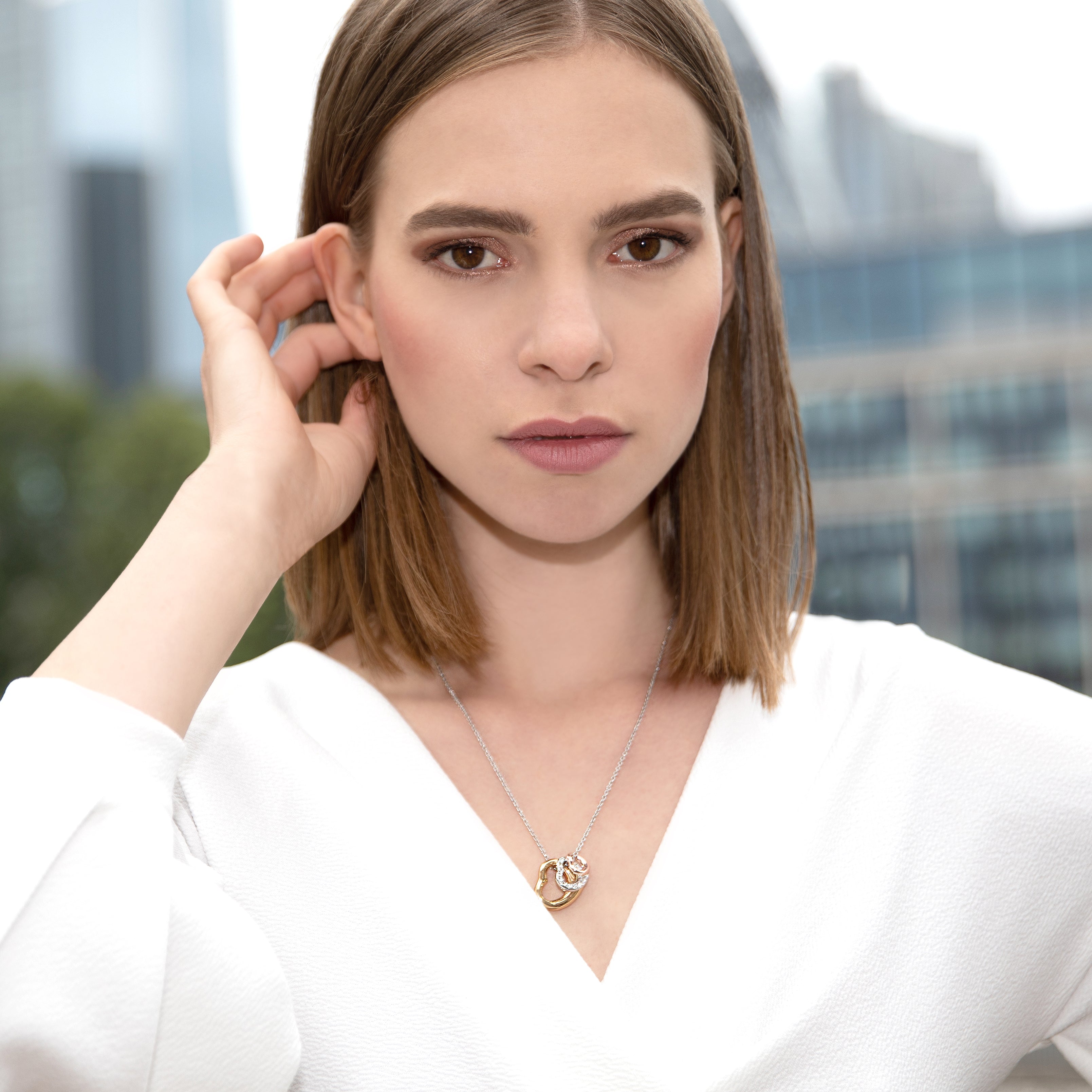 Mixed Plating Pendant with 3 Hearts and Crystals