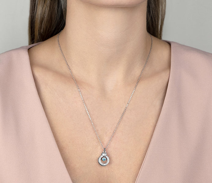 Rhodium Plated Pendant with Light Aquamarine Swing