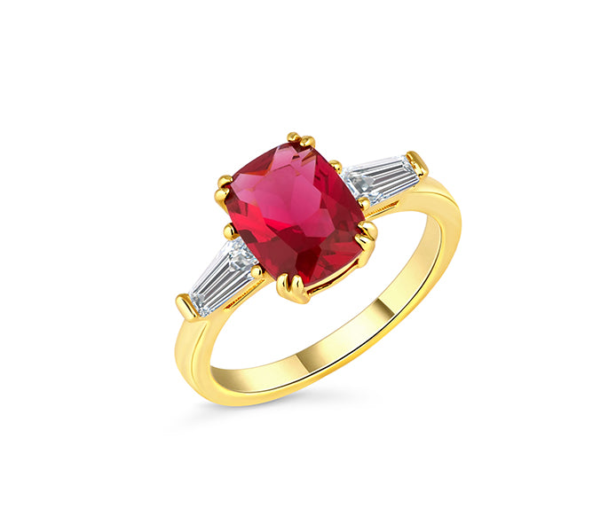 Ruby oval ring with clear side stones in yellow gold plating