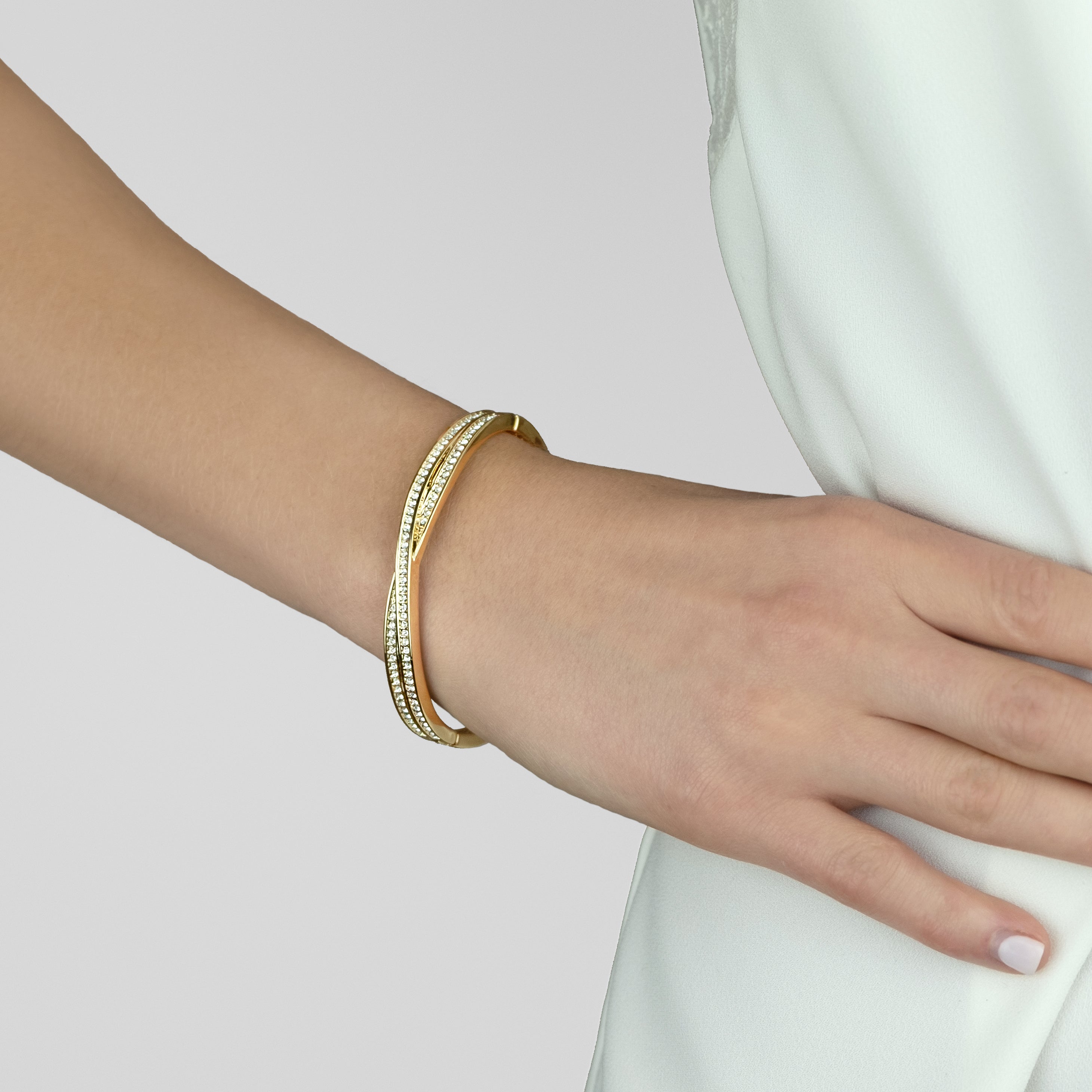 Criss Cross Bangle in Yellow Gold Plating