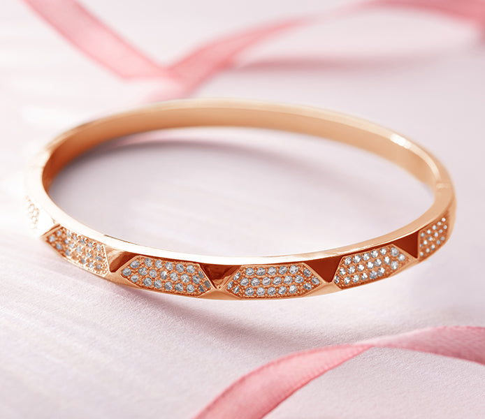 Stud bangle in rose gold plating